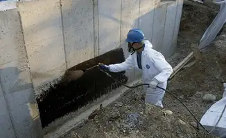 Professional waterproofing the exterior walls of the basement in Fort Lauderdale, FL