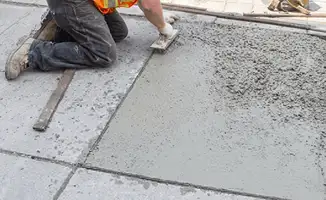 Professional repairing a concrete floor in Fort Lauderdale, FL
